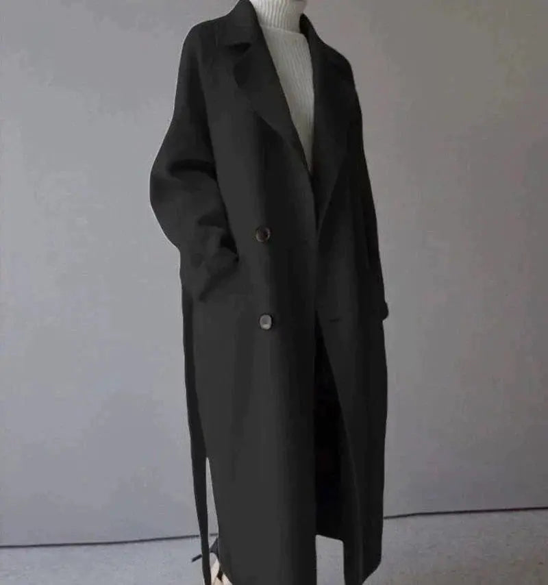Black long wool coat with notched lapels, button front, and long sleeves