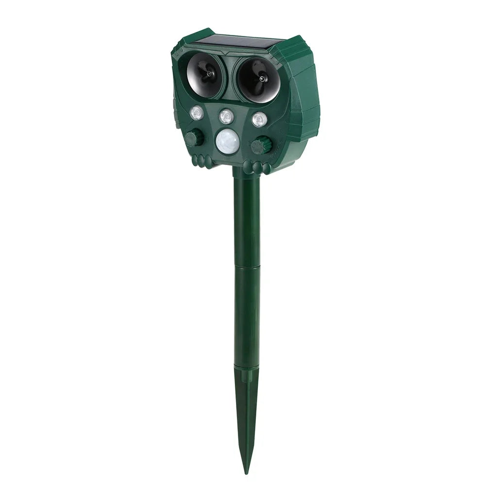 Solar ultrasonic animal repeller stake, dark green with solar panel and twin speakers