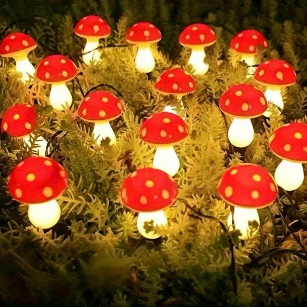 Solar mushroom garden light set: red caps and warm yellow glowing mushroom bulbs on stakes