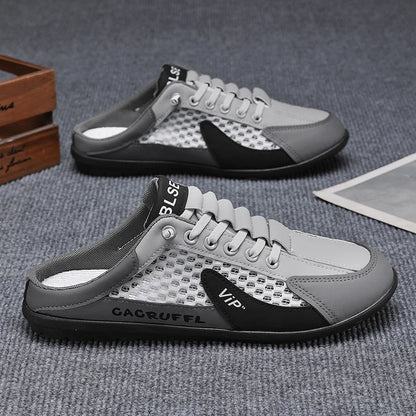 Men's mesh slip-on loafer shoes, light gray with black paneling, closed toe.