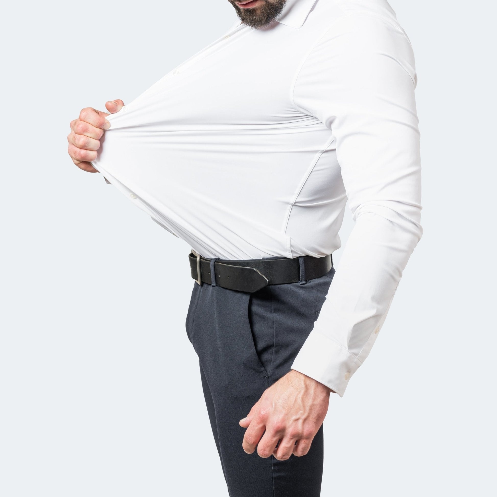 Men's white long-sleeve button-up shirt with spread collar and button cuffs