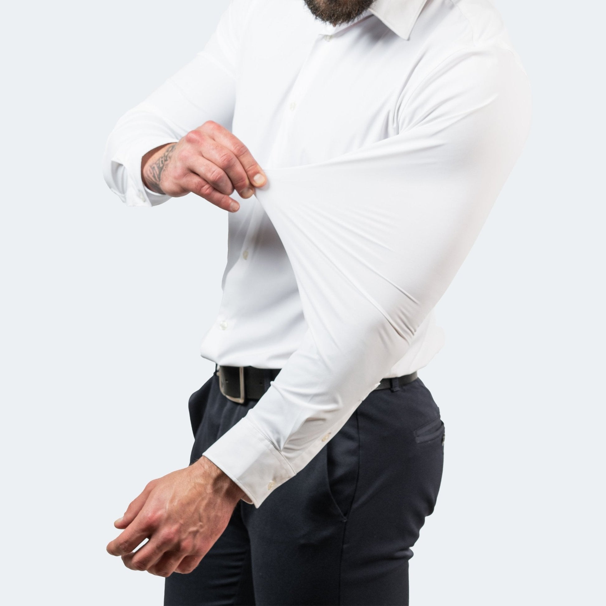 Men's white long-sleeve button-up shirt with spread collar and button cuffs