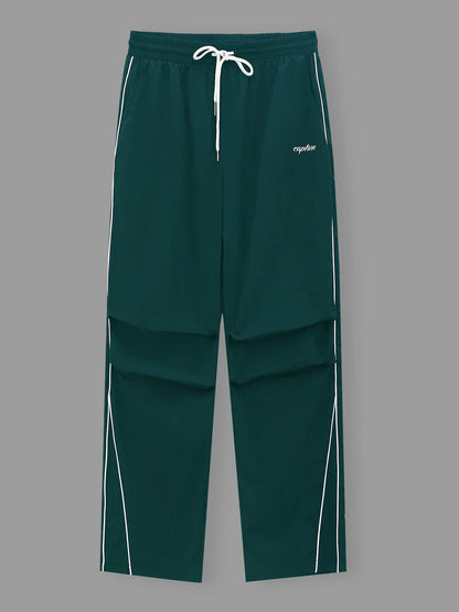 Men's teal green wide-leg trousers with white side stripe and drawstring waist