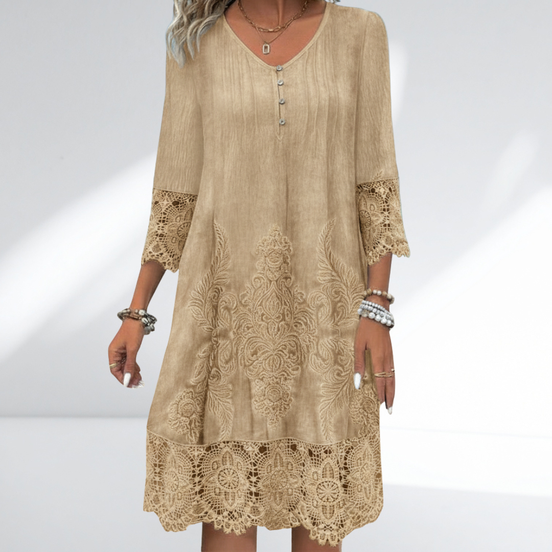 Embroidered lace tunic dress in khaki with buttoned V neckline and lace trim at hem