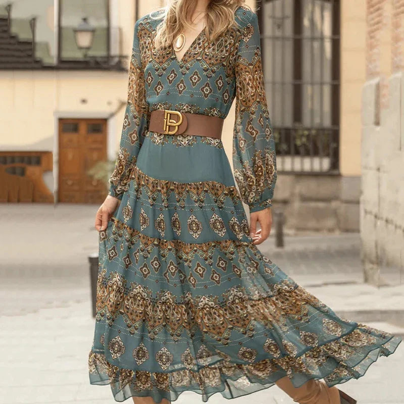 Long-sleeve boho tiered maxi dress in teal with diamond print and gold waist belt