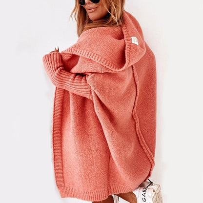 Coral hooded knit cardigan with long sleeves and ribbed cuffs