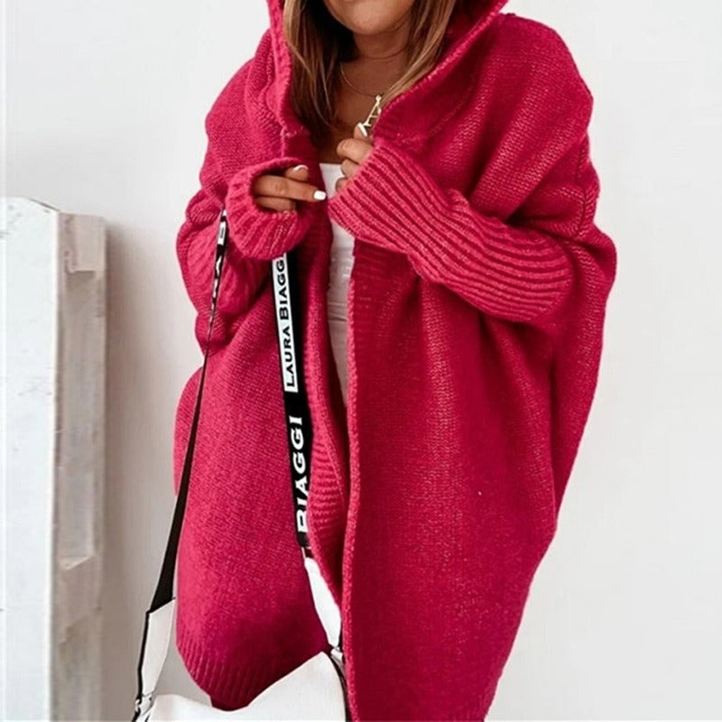 Fuchsia red hooded knit cardigan with long sleeves and ribbed cuffs