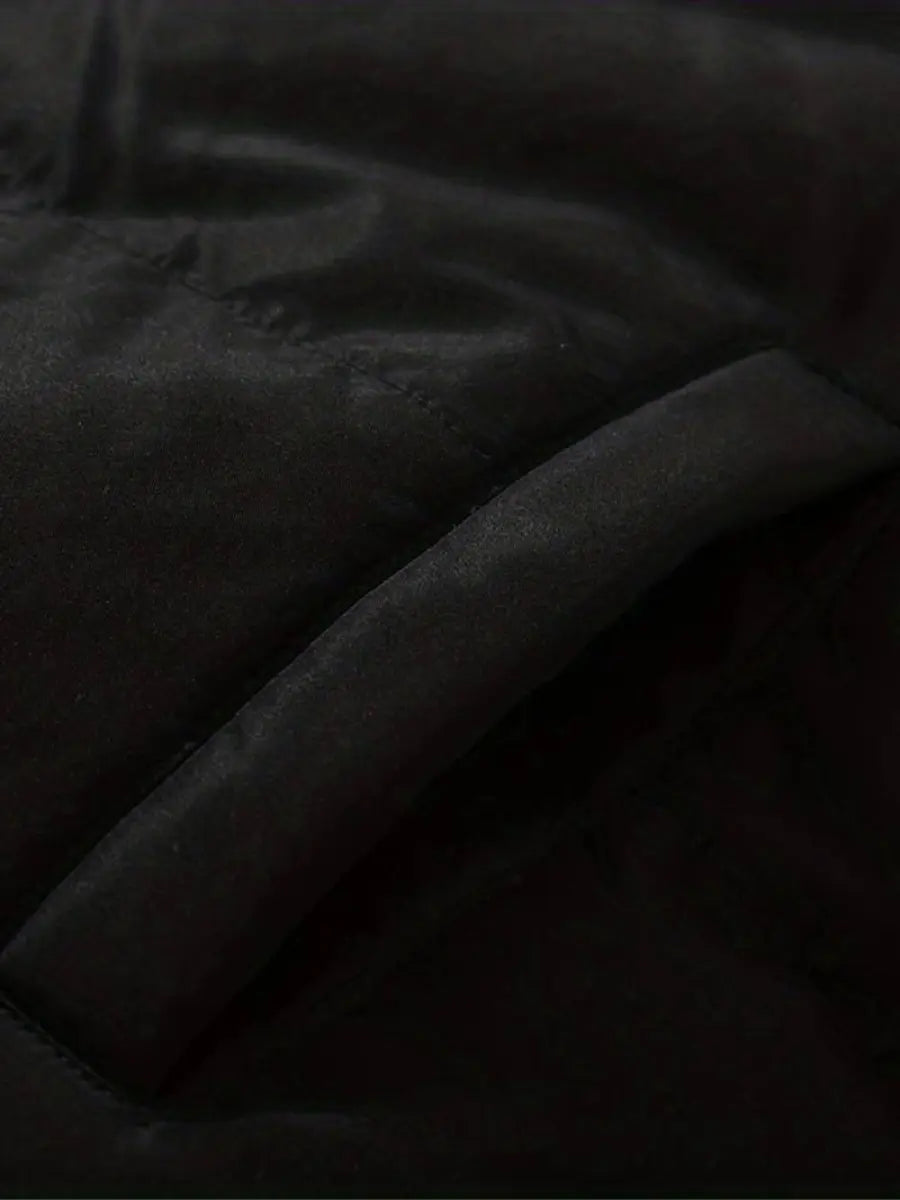 Women’s warm zip-up winter jacket fabric detail, matte black insulation