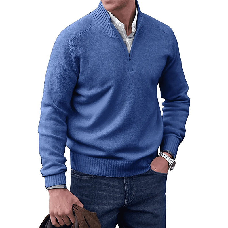 Blue zip-collar knit pullover with quarter-zip front and ribbed waistband