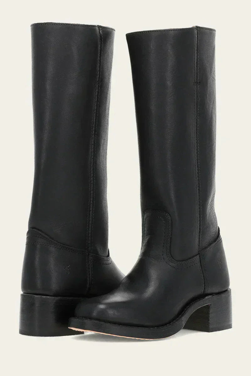 Pair of women’s leather knee-high boots in black with smooth shaft and low block heel