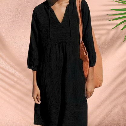 Black V-neck tunic dress with gathered waist, textured fabric, 3/4 sleeves