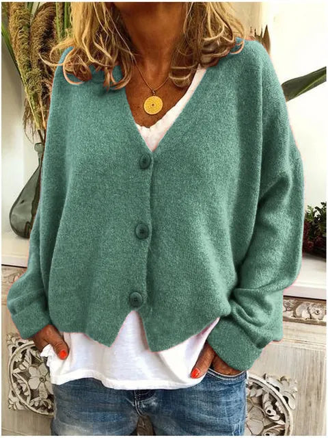 Green cotton button front jacket with long sleeves and V-neck collarless placket