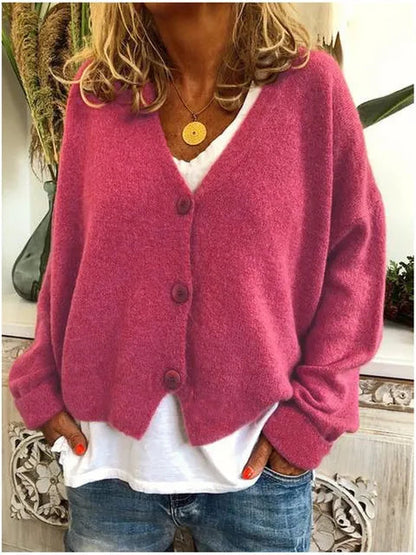 Pink cotton button front jacket with long sleeves and V-neck center button closure