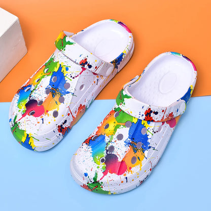 Ivory air-cushion clogs with paint-splatter print, slingback strap, thick sole