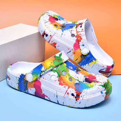 Ivory air-cushion clogs with paint-splatter print and slingback strap, thick sole