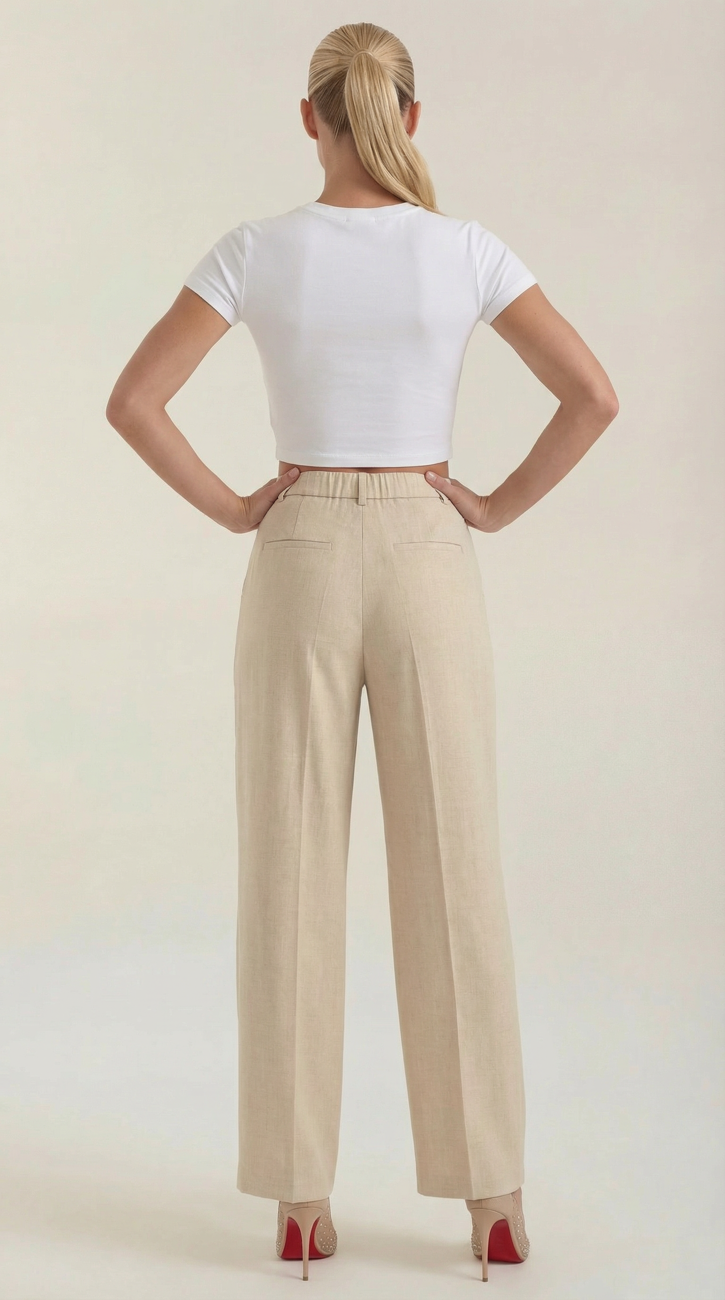 Pleated high-rise wide-leg pants, beige, back view with elastic waistband