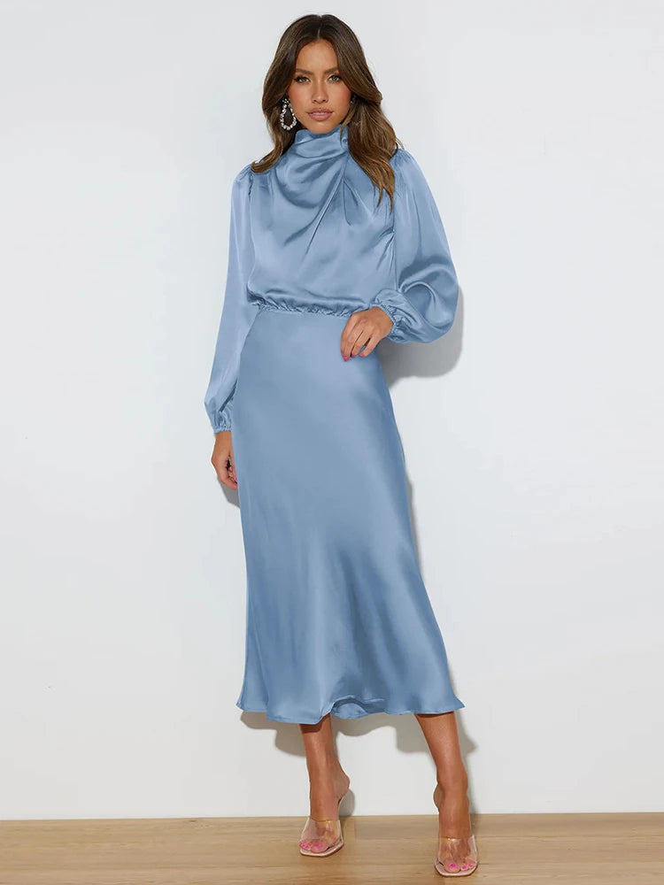 Light blue satin cowl-neck midi dress with long sleeves, draped neckline