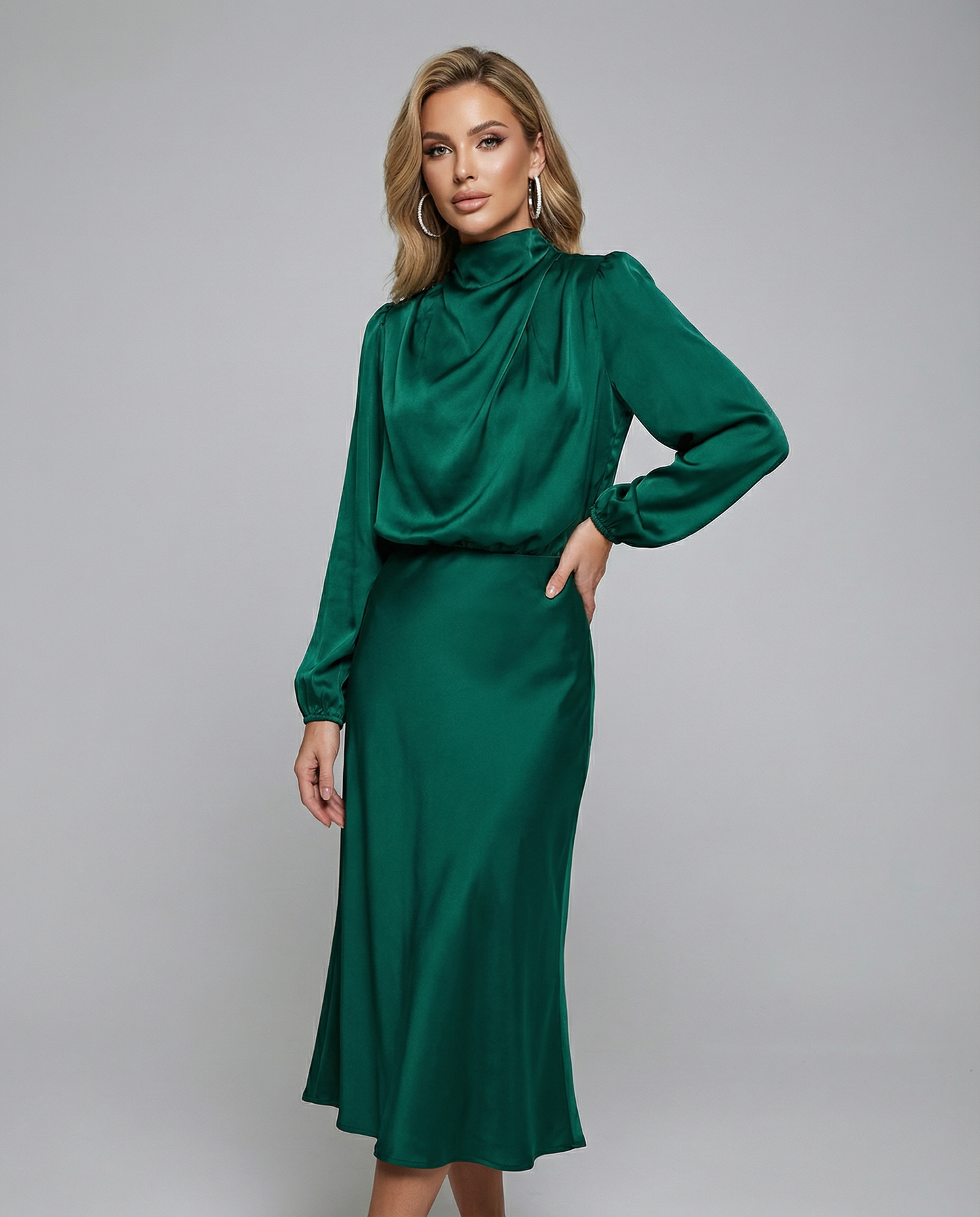 Green satin cowl-neck long-sleeve midi dress with draped neckline and fitted waist