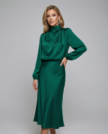 Green satin cowl-neck long-sleeve midi dress with draped neckline and fitted waist