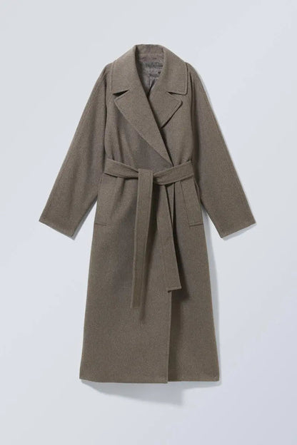 Grey oversized long wool coat with notched lapels and tied waist belt, front view.