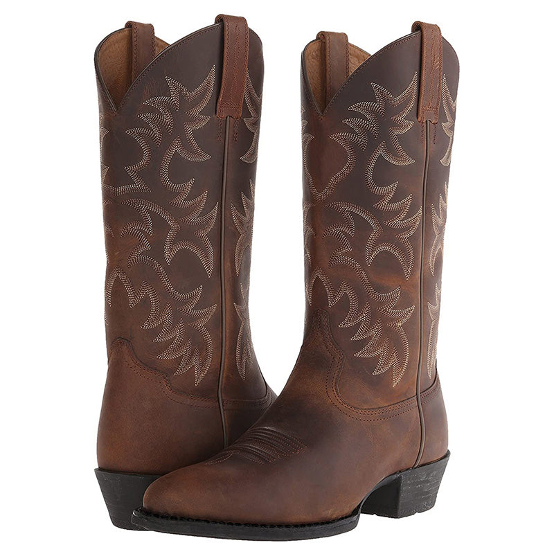 Women's brown western cowboy boots with embossed floral pattern and side pull tab