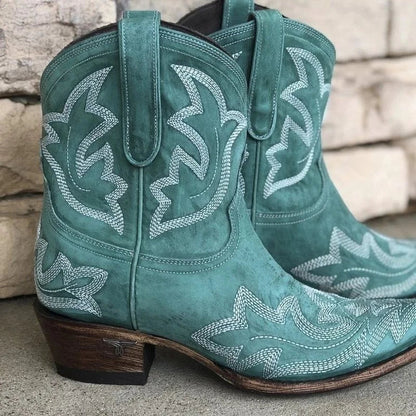 Green women's cowboy boots with white western embroidery, pull-on, medium block heel.