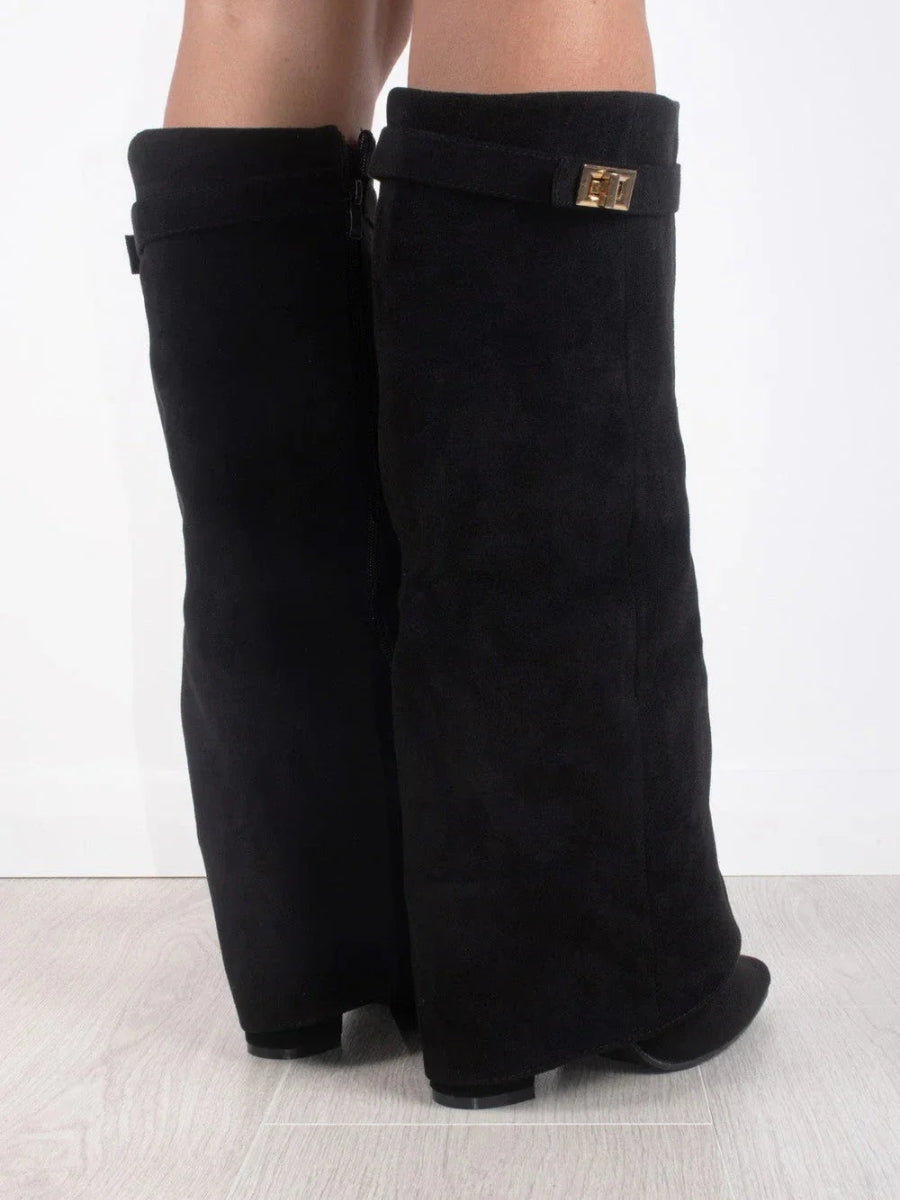 Black suede knee-high boots, side back view, with square buckle strap and heel