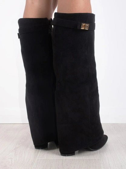 Black suede knee-high boots, side back view, with square buckle strap and heel