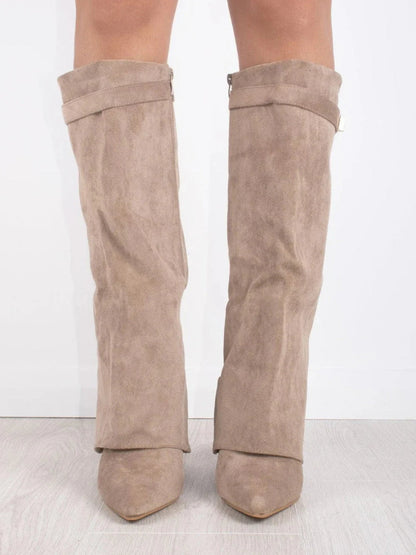 Beige suede knee-high boots, rear view, with square buckle strap and pointed toe