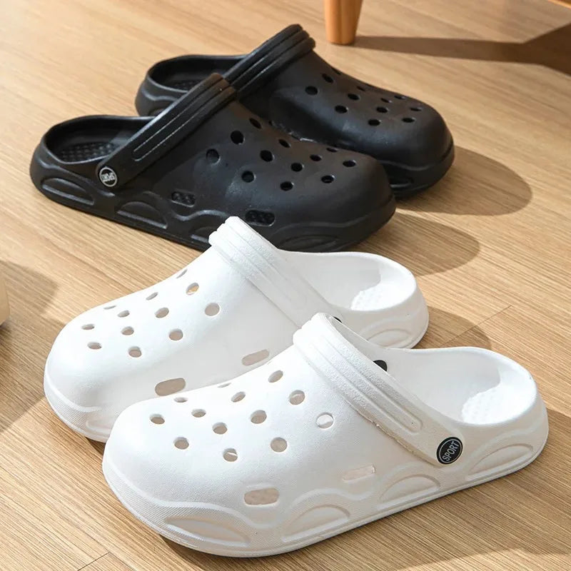 Unisex garden clogs, black and white slip-on slides with perforations and molded footbed