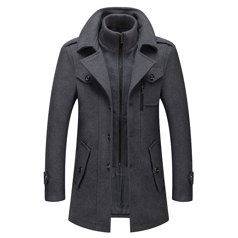 Men’s grey wool coat with stand-up collar, zip front, and double-breasted button details