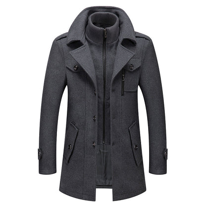 Men’s grey wool coat with stand-up collar, zip front, and double-breasted button details