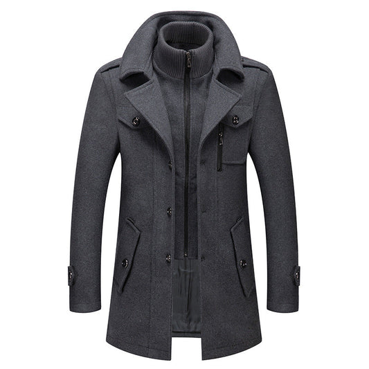 Men’s grey wool coat with stand-up collar, zip front, and double-breasted button details