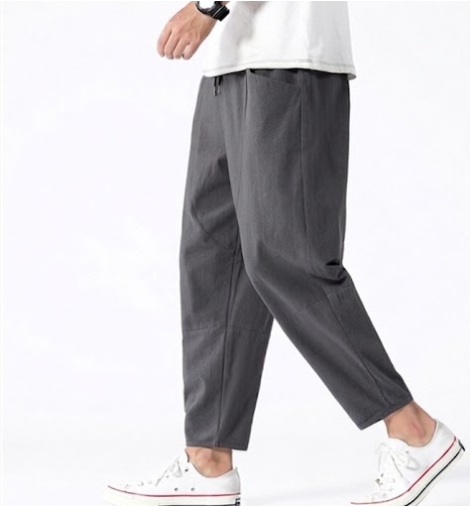 Gray cropped drawstring pants with elastic waistband, relaxed tapered fit