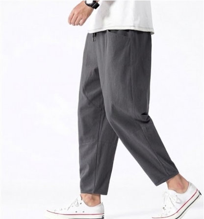 Gray cropped drawstring pants with elastic waistband, relaxed tapered fit