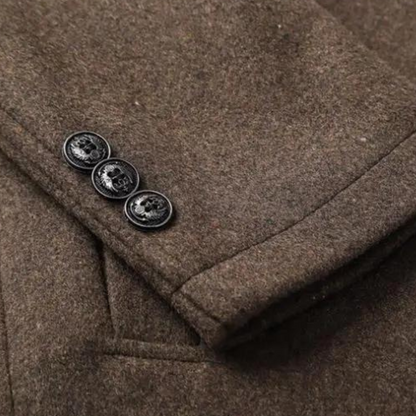 Men's brown wool coat close-up of button placket and folded edge