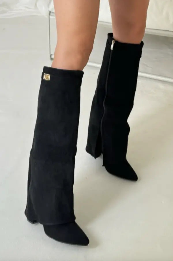 Women's black knee-high boots with fold-over cuff and square buckle detail