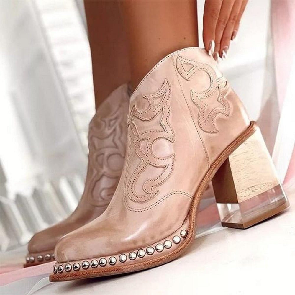 Women's western ankle boots in light blush pink with decorative stitching and studded trim