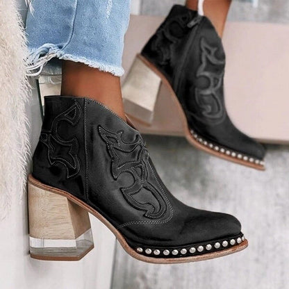 Women's western ankle boots in black with ornate stitchwork and silver-stud trim