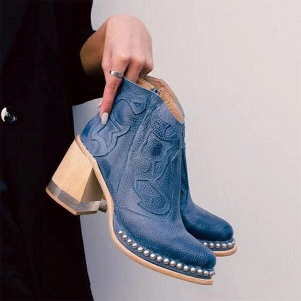 Women's western ankle boots in denim blue with decorative stitching and silver-stud trim