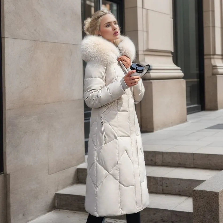 White long down coat with quilted panels and fluffy fur-trimmed hood