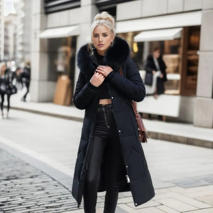 Dark long down coat with quilted finish and fluffy fur-trimmed collar hood