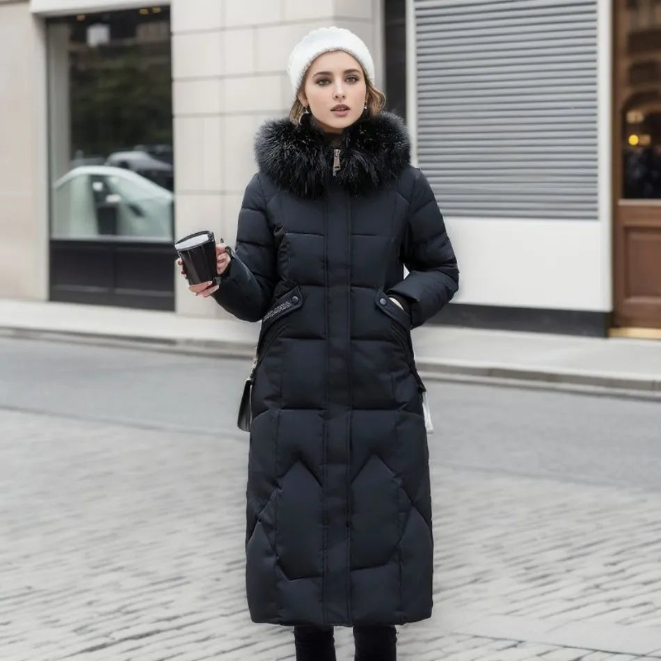 Black long down coat with quilted panels and fur-trimmed hood at the neckline