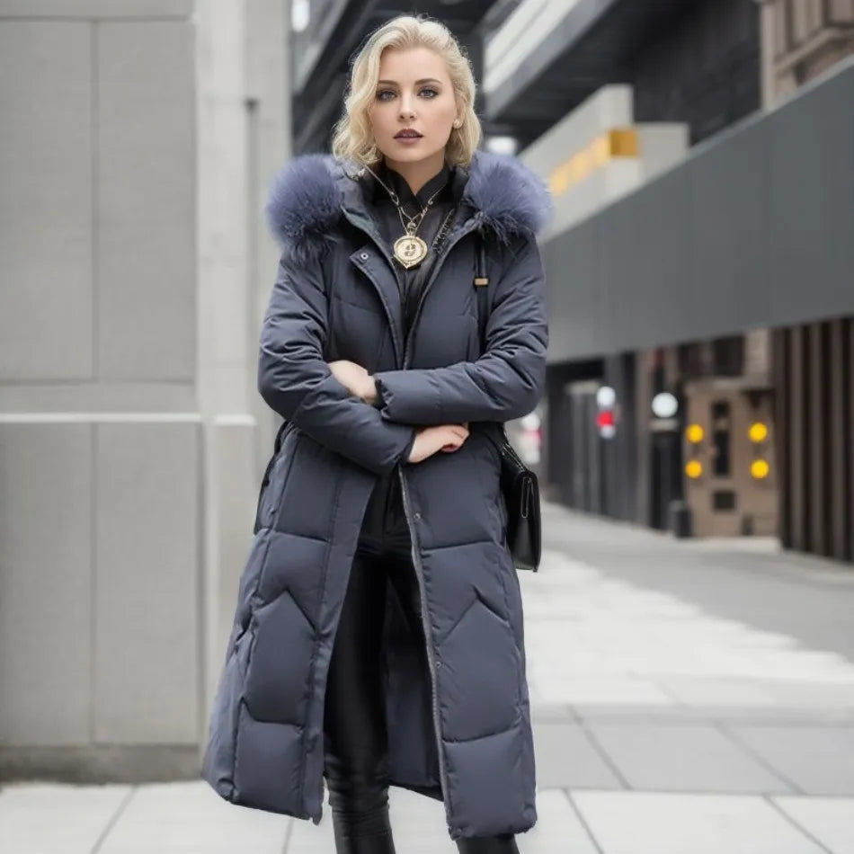 Dark charcoal long down coat with quilted panels and fluffy fur-trimmed hood