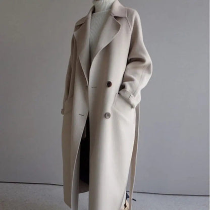 Beige long wool coat with notched lapels, double-breasted buttons, and side pockets