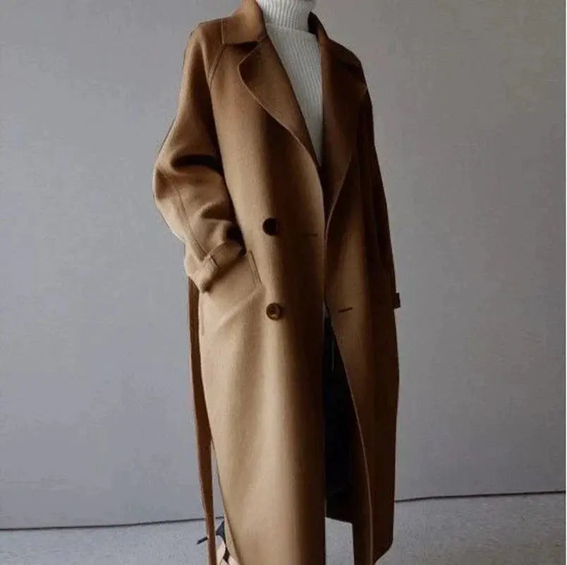 Brown long wool coat with notched lapels, button front, and belted waist detail