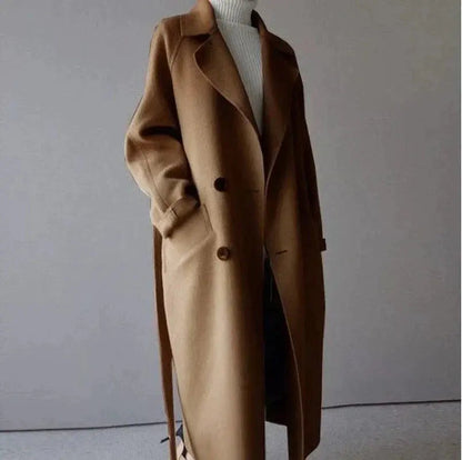 Brown long wool coat with notched lapels, button front, and belted waist detail