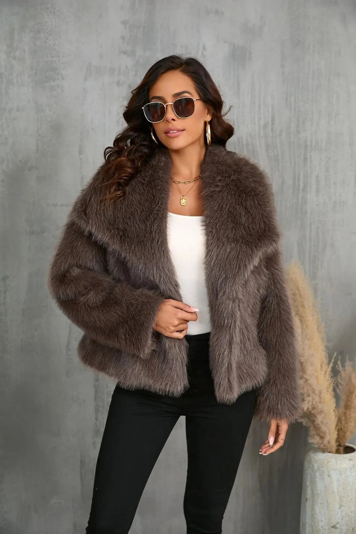 Dark brown faux fur jacket with wide collar and front closure