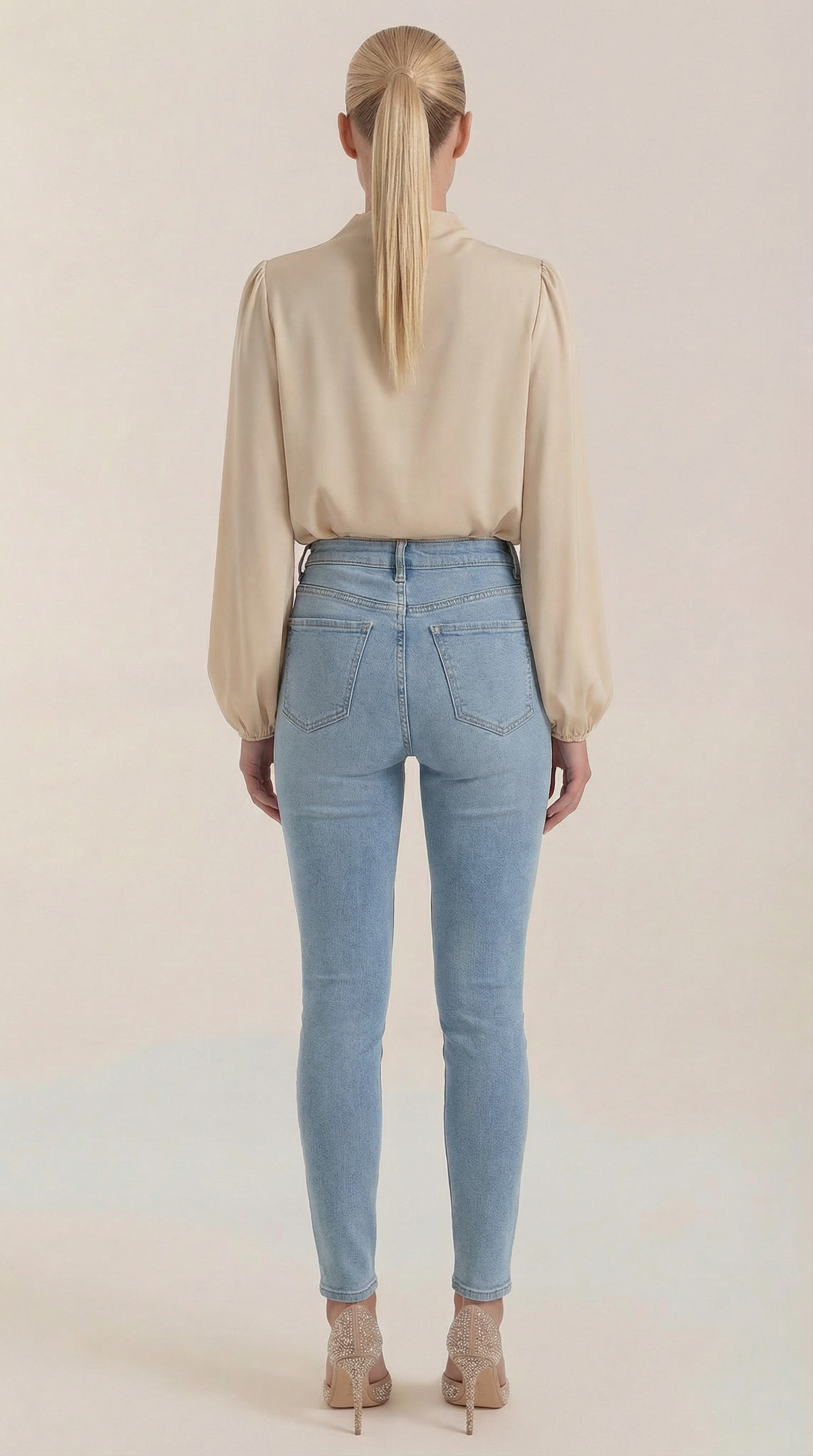 Draped long sleeve blouse in beige satin, back view with draped neckline