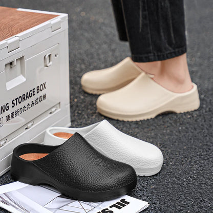 Black and white slip-on clogs with textured uppers and ridged non-slip outsoles